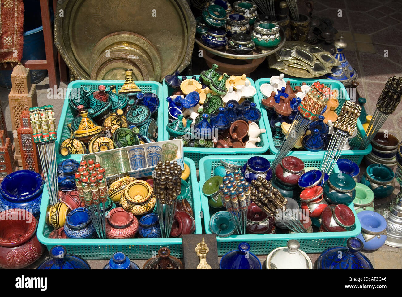 Marrakesh, Morocco. Moroccan pottery and souvenirs outside a souvenir shop in the Madina, Souk, market area. Stock Photo
