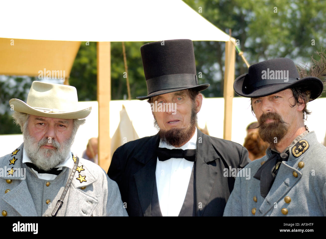 Confederate generals John Hunt Morgan and Robert E Lee with Union President Abraham Lincoln at an American Civil War reenactment Stock Photo