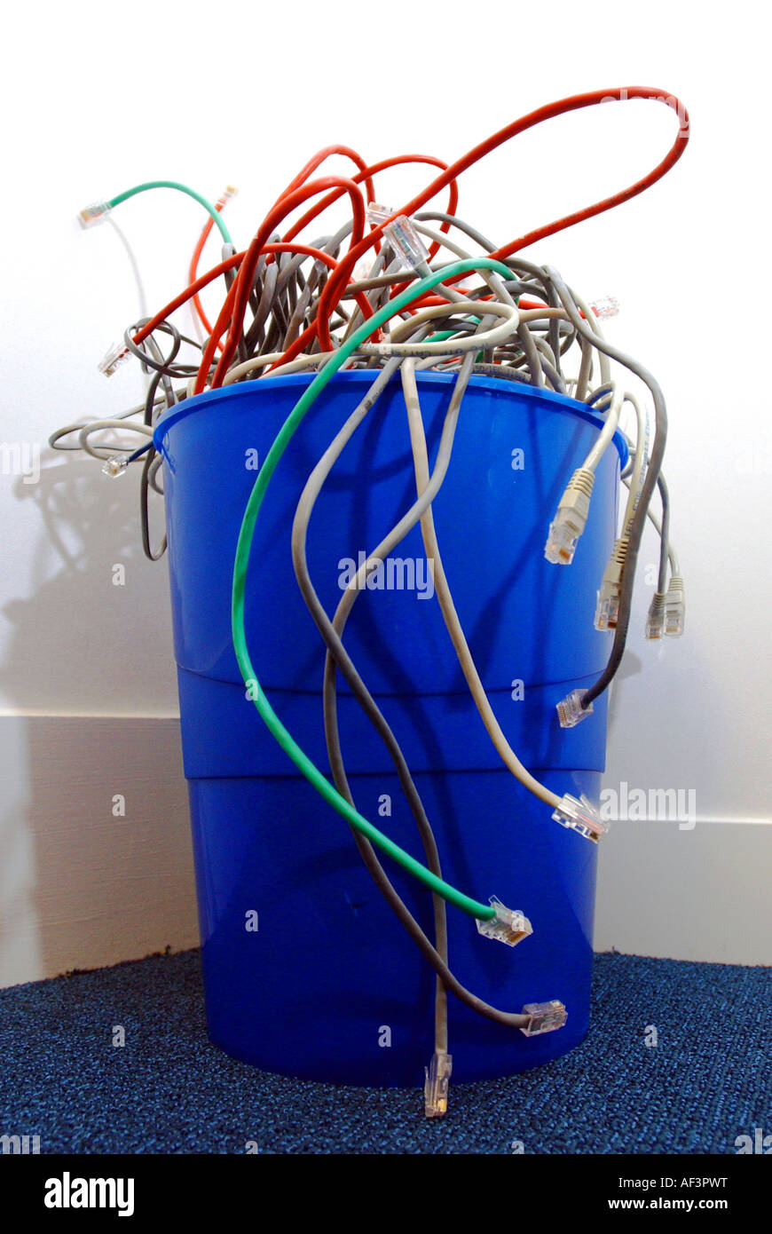 Pile of cables in rubbish bin Stock Photo Alamy