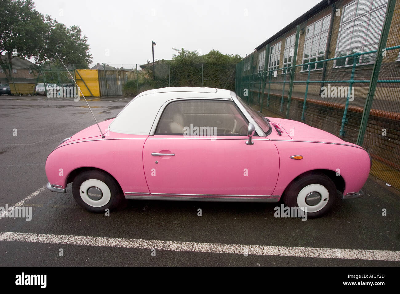 Pink and white two tone Nissan Figaro classic cult car Stock Photo