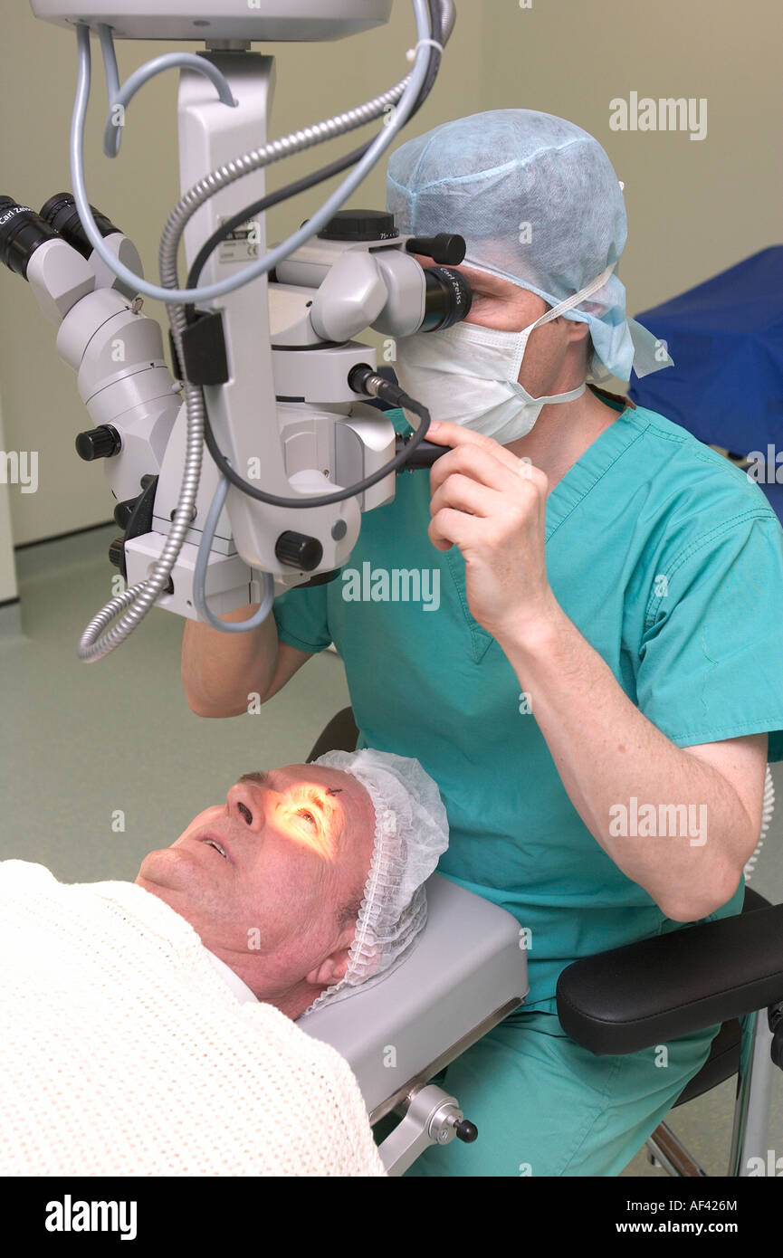 A patient undergoes an eye examination by a surgeon in an eye hospital. Stock Photo