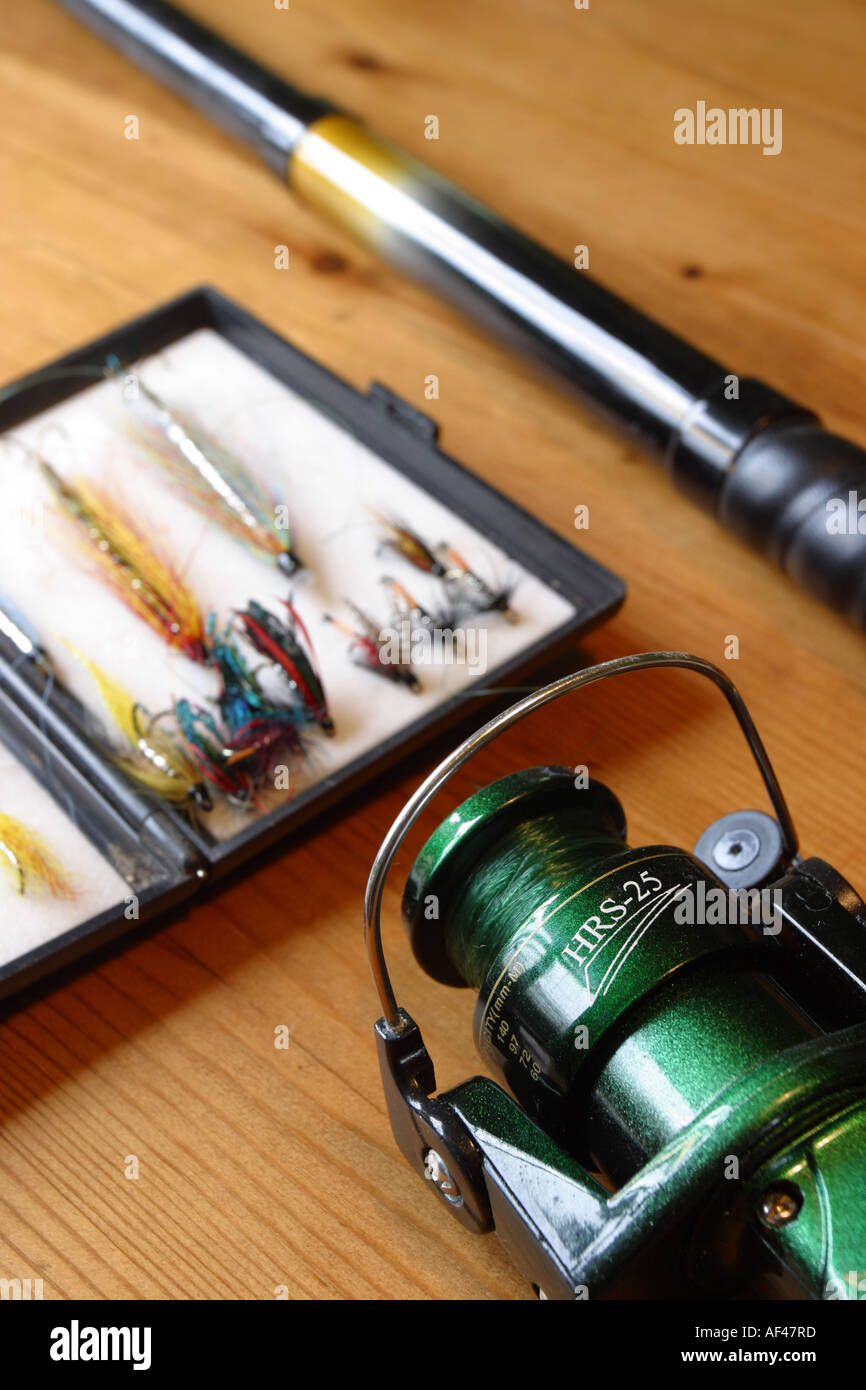 Fly fishing decoy flies and fishing rod and reel Stock Photo