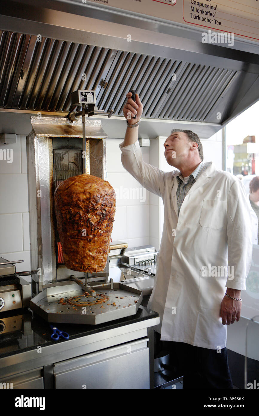 Food Quality Control Inspector Checks A Turkish Snack Bar Stock Photo food-quality-control-inspector-checks-a-turkish-snack-bar-stock-photo