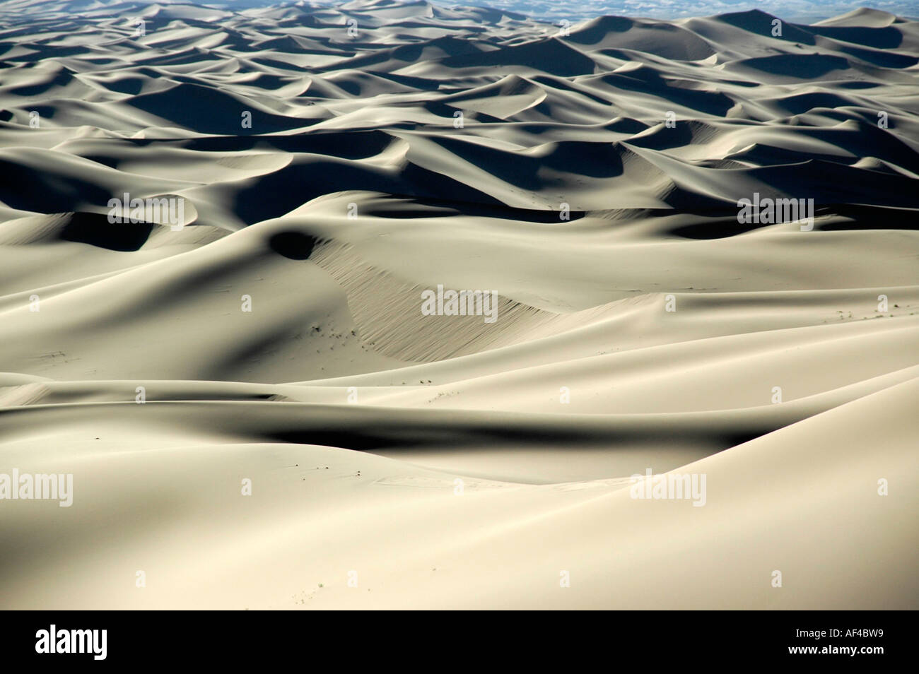 Light and shade on widespread sand dunes in Gobi Desert Khongoryn Els Gurvan Saikhan National Park Mongolia Stock Photo