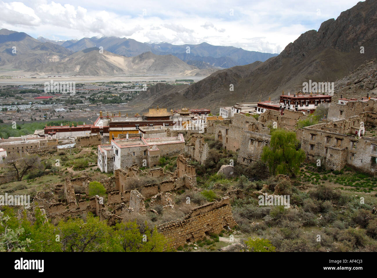 Buildings and ruins of Drepung Monastery and the surrounding Lhasa ...