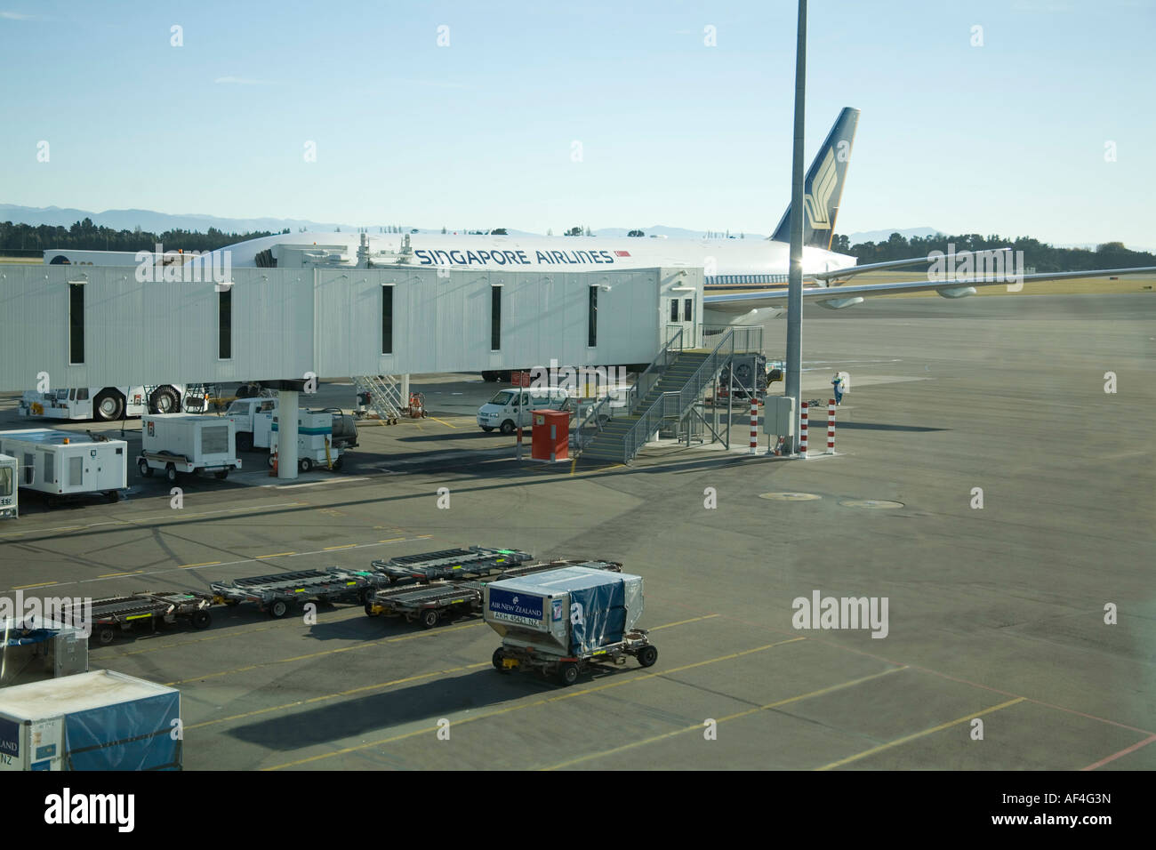 CHRISTCHURCH INTERNATIONAL AIRPORT SOUTH ISLAND NEW ZEALAND May A Singapore Airlines plane parked at an air bridge Stock Photo