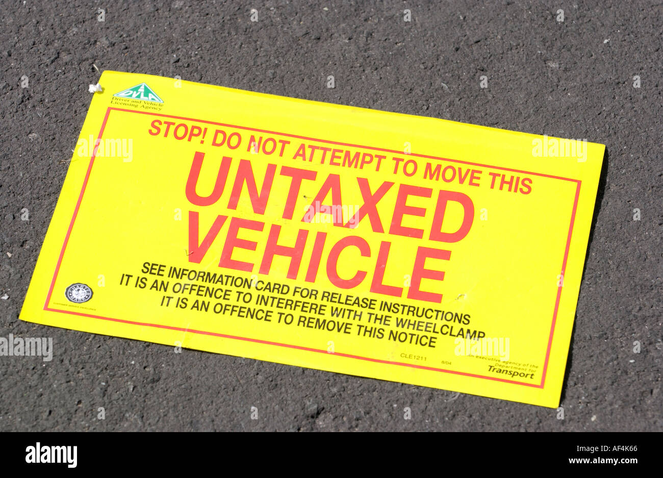 Window sticker removed from an untaxed vehicle in a DVLA operation in Newport South Wales UK Stock Photo