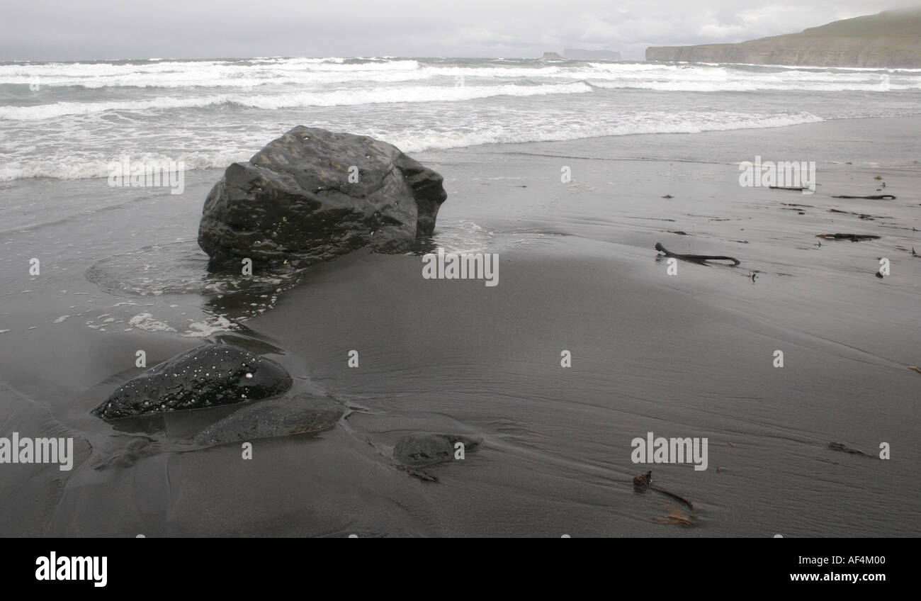 A beach with Drangey Island on the horizon near Sauoarkrokur in northern Iceland Stock Photo