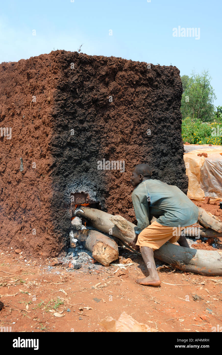 Bricks being baked and fired in Western Kenya at the side of the Kisumu Maseno road in Kenya East Africa Stock Photo