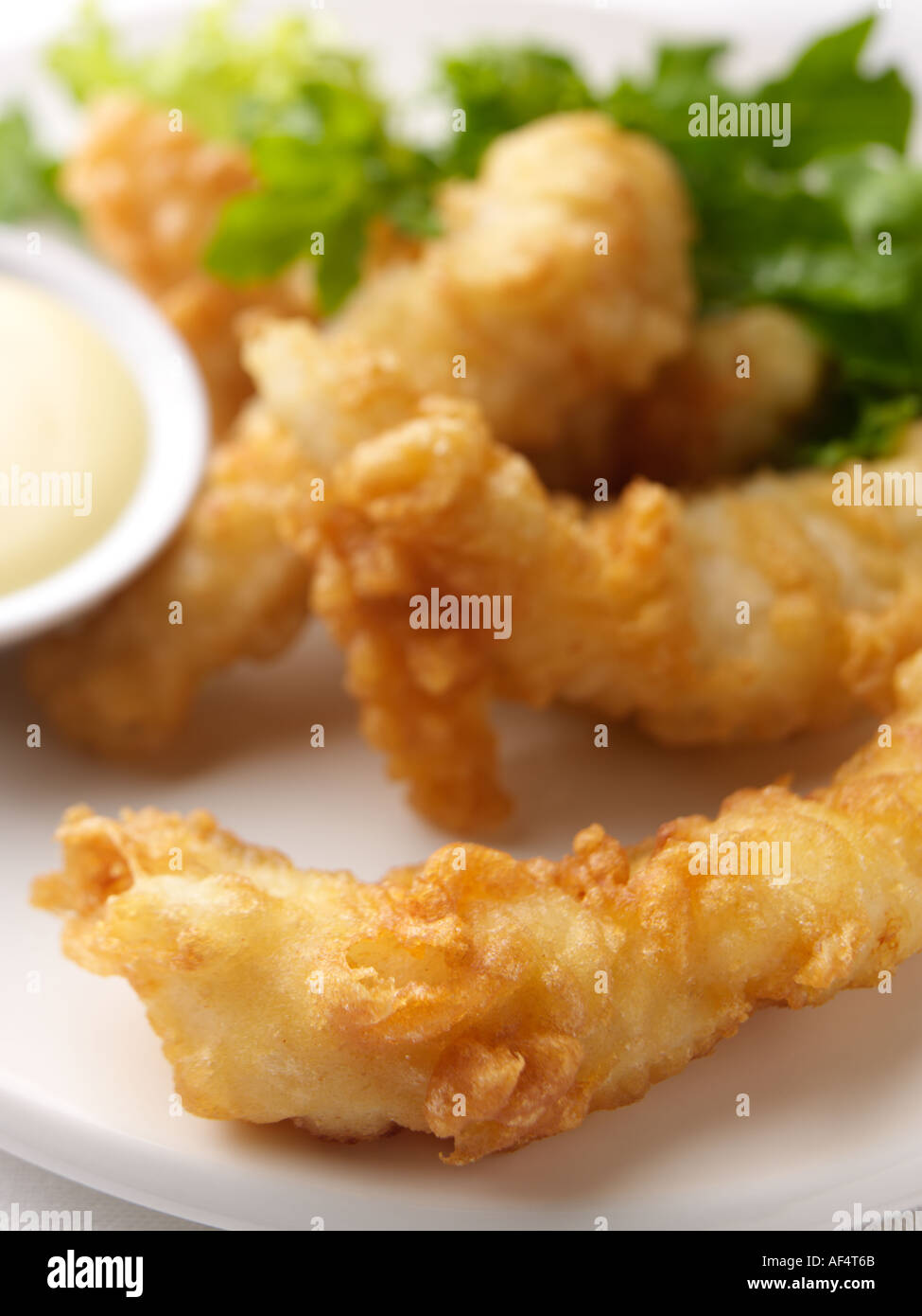Deep fried battered cod goujons seafood hires stock photography and images Alamy