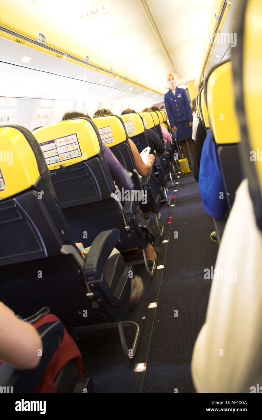 Interior showing seats and aisle Ryanair passenger plane Stock Photo