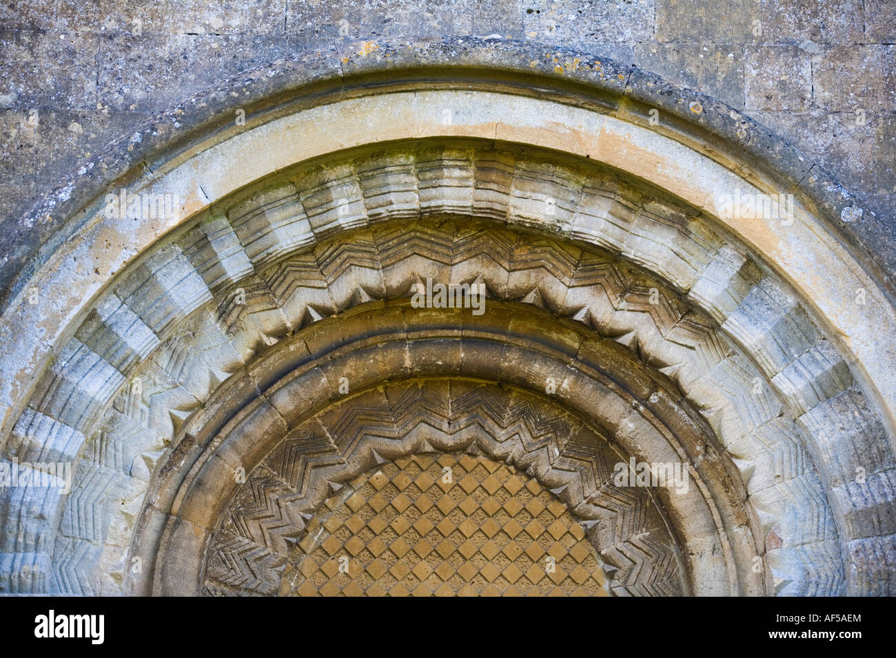 Tympanum at the church of St Mary at Guiting power The Cotswolds Gloucestershire UK GB Stock Photo