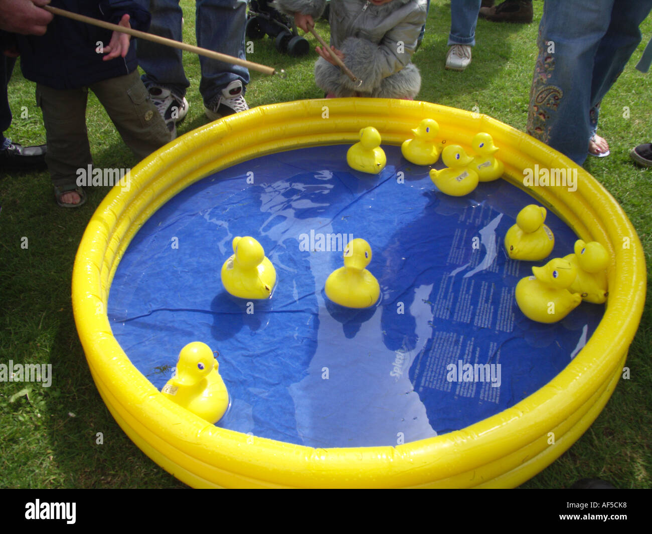 Hook the duck game at summer fete Suffolk England Stock Photo 7906871