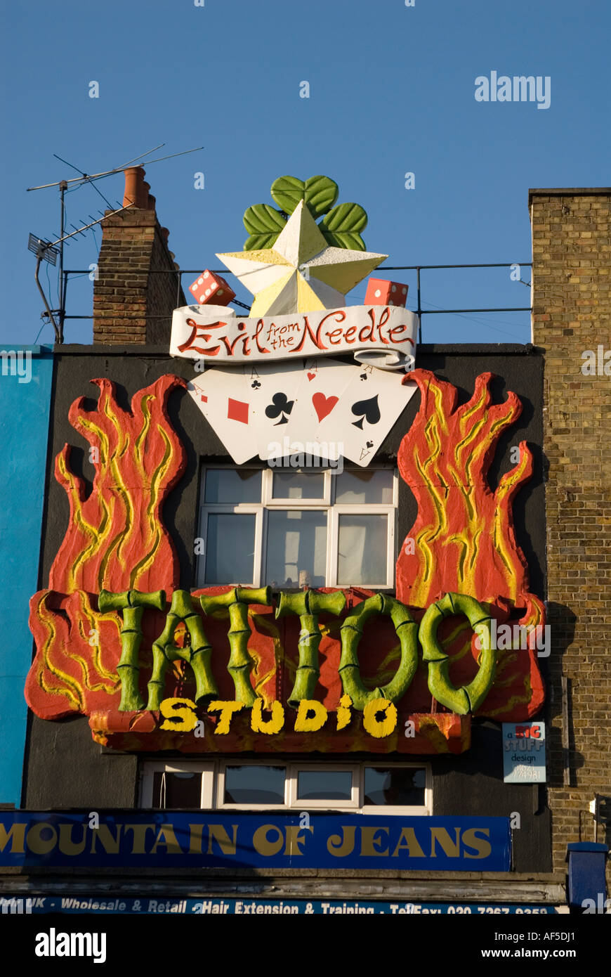 Evil Needle tattoo studio in Camden Market London England UK Stock Photo