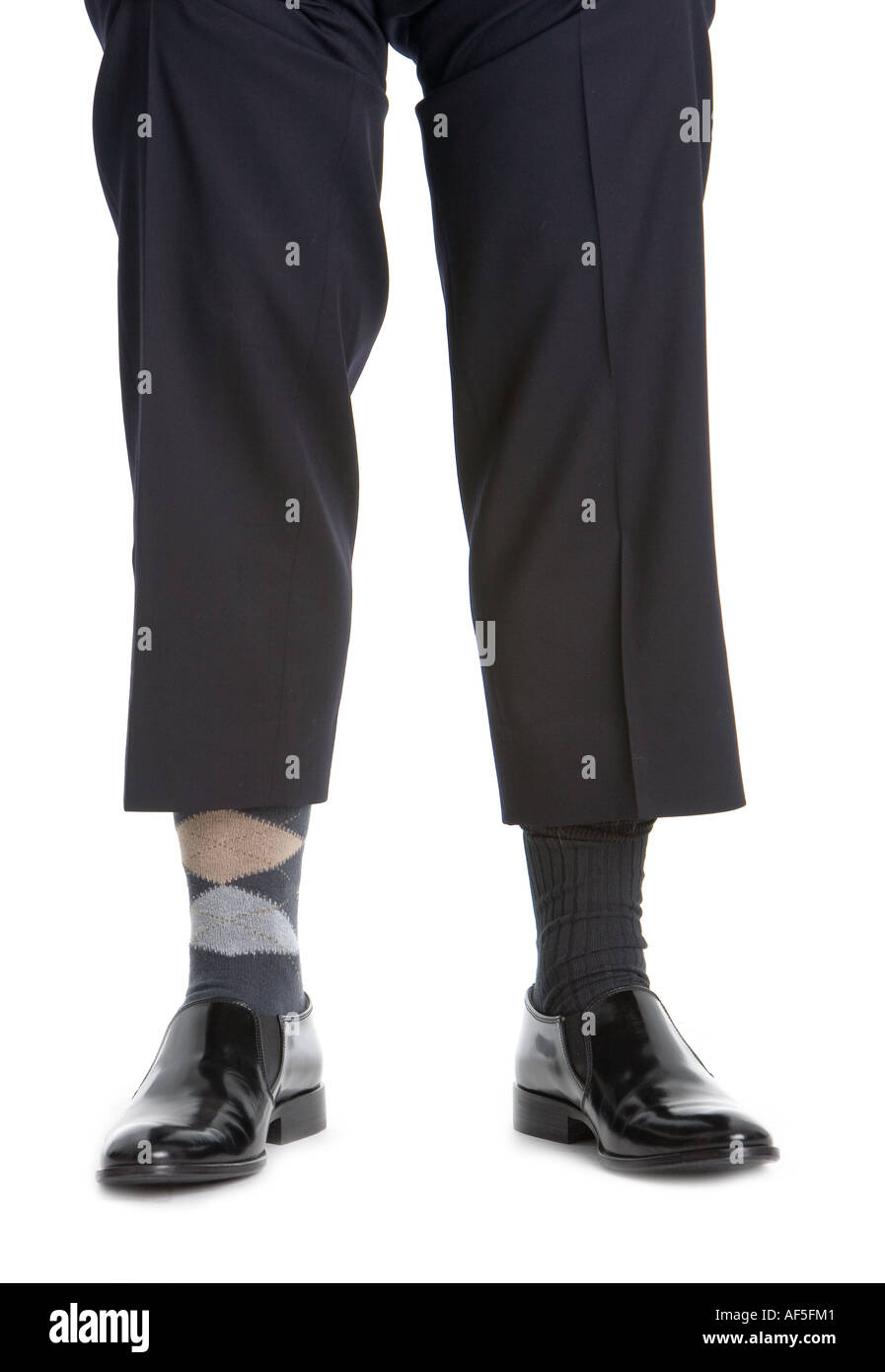 Business man wearing odd socks Stock Photo