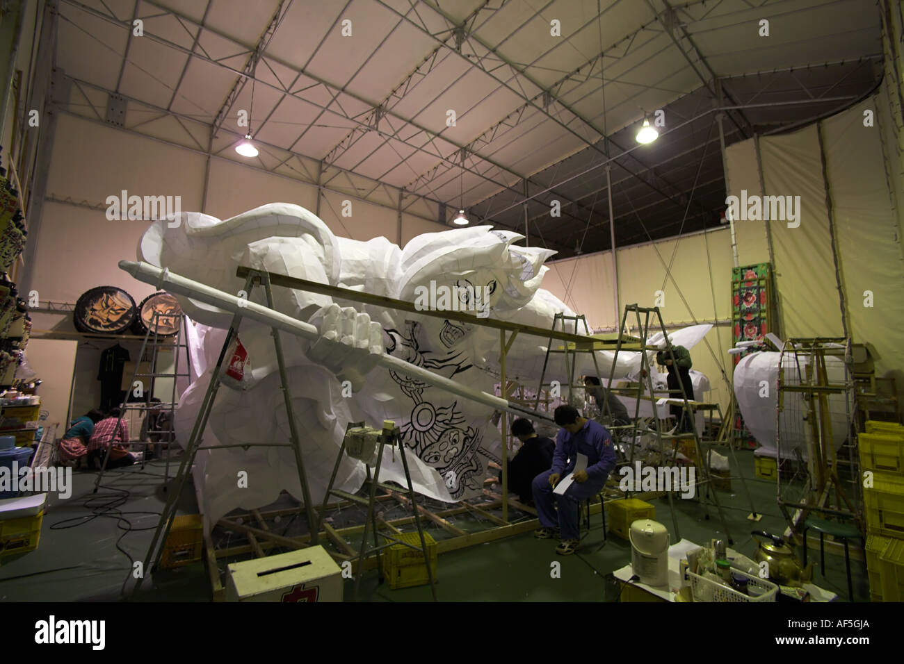 Craftsmen and artists build the floats for the Nebuta Summer festival in Aomori City Stock Photo