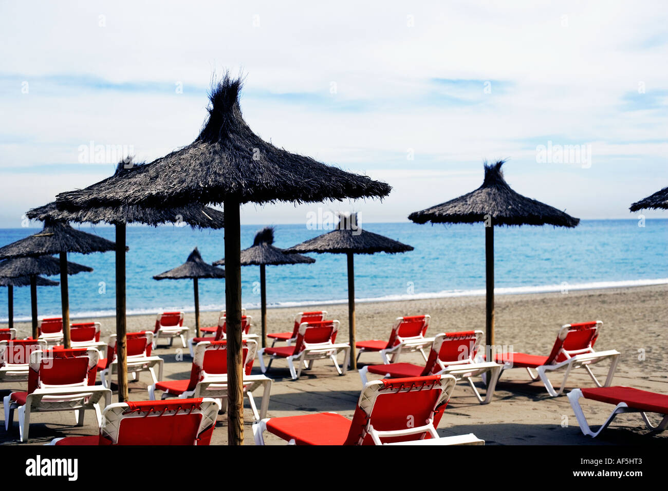 Beach with sun loungers Stock Photo Alamy