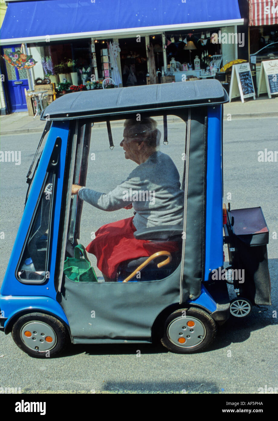 Disabled Woman Going Shopping in the Uk Stock Photo Alamy
