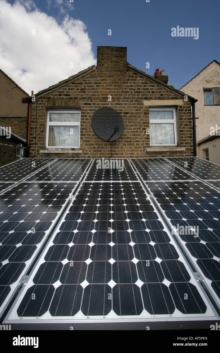 Solar panels being installed on the roof of a house in South East