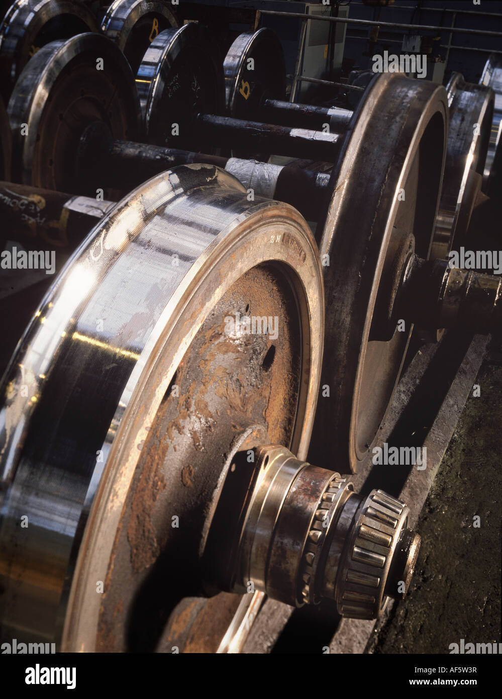 Railway carriage wheels awaiting repair Stock Photo
