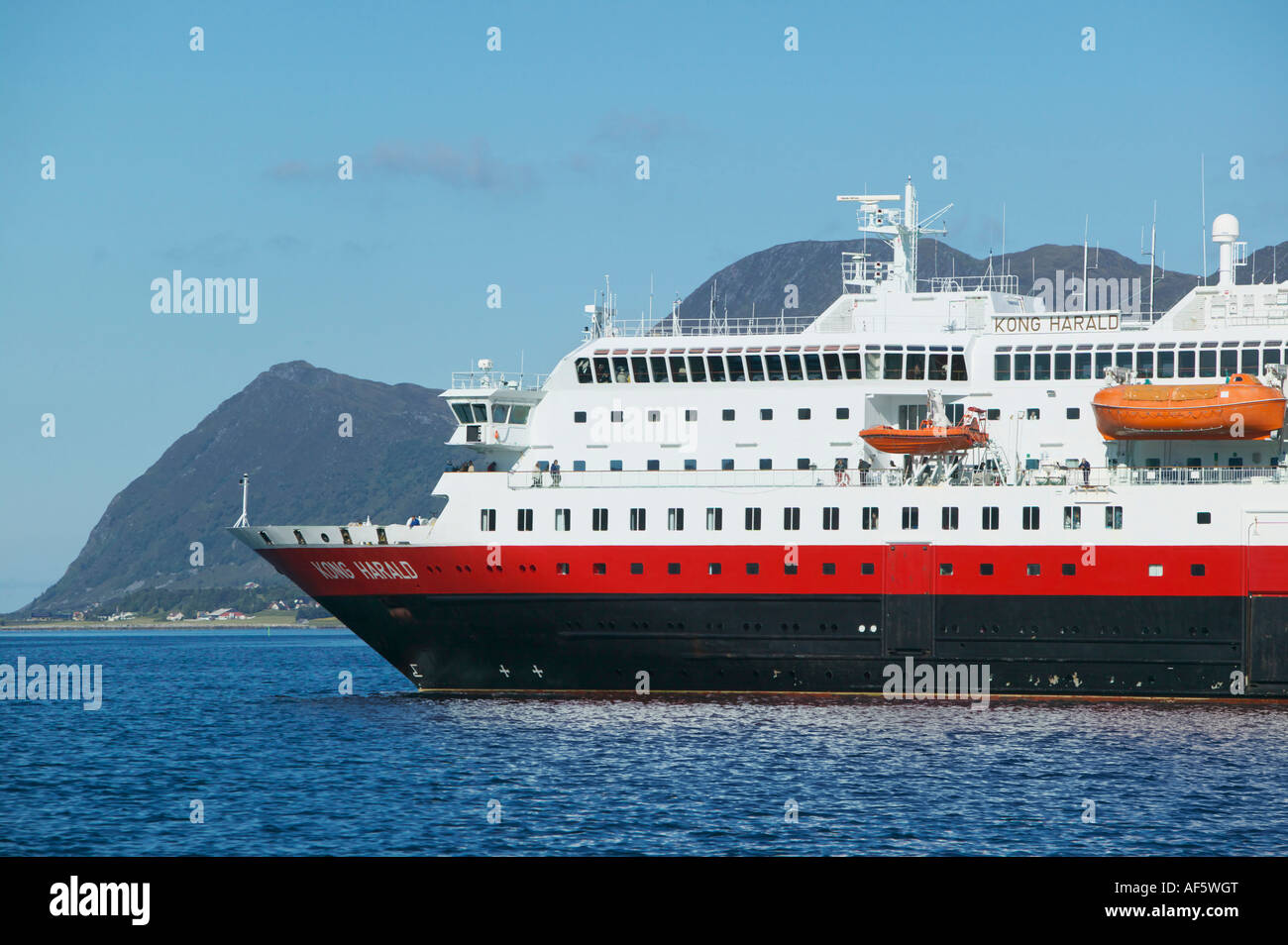 The Hurtigruten ferry Kong Harald near Alesund More og Romsdal Norway Stock Photo