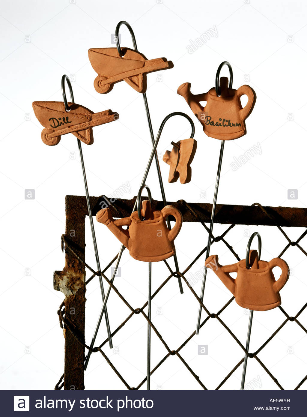 Small Terracotta Garden Tools As Name Labels For Plants Stock Photo Small Terracotta Garden Tools As Name Labels For Plants