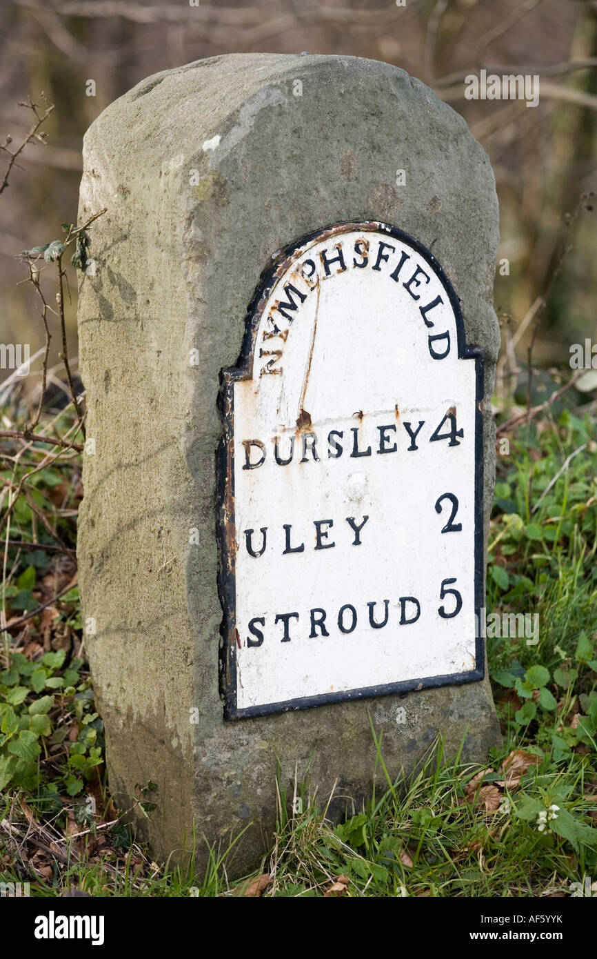 An old iron milestone at Nympsfield on the Cotswold Way, Nympsfield Gloucestershire, UK Stock Photo