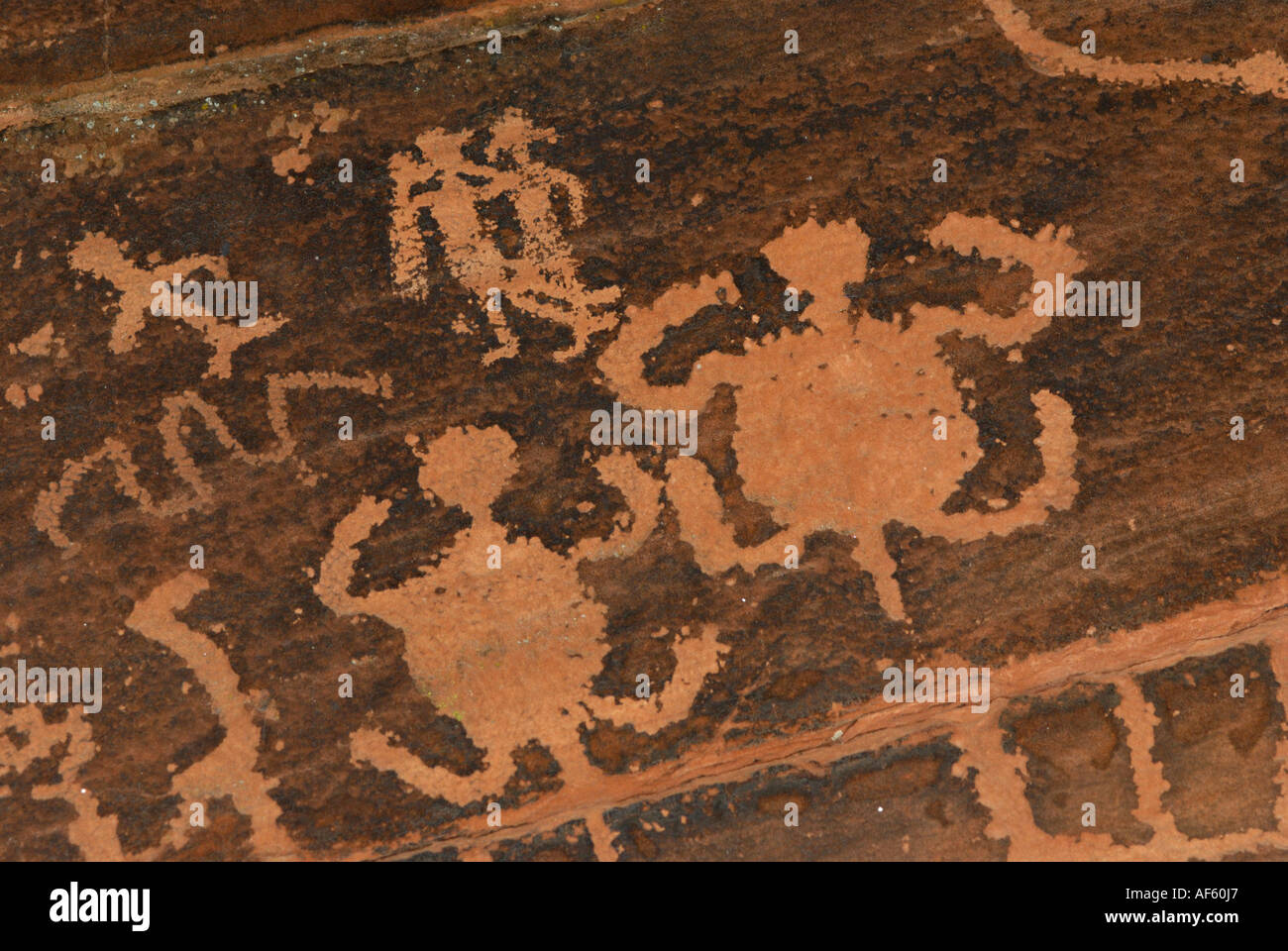 Native American petroglyphs of people and turtle pairs, V bar V Heritage site, Arizona Stock Photo