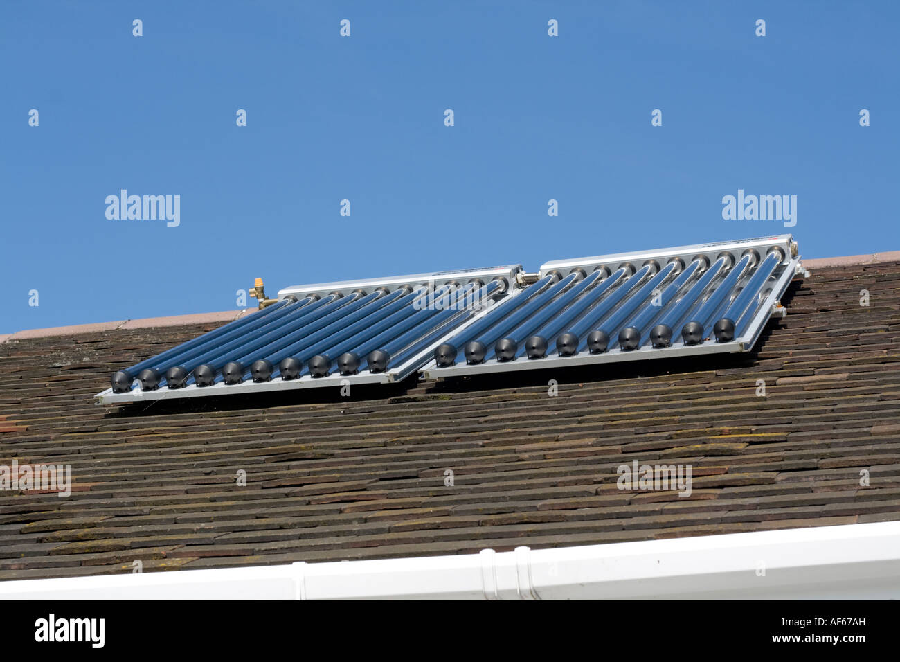 Solar thermal panels with evacuated tubes on roof of Worcestershire ...