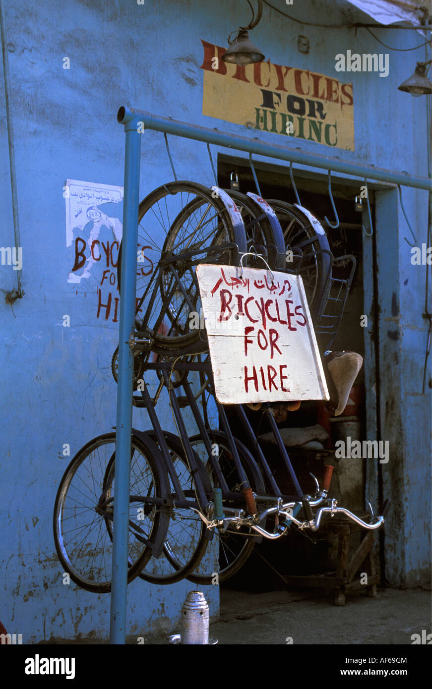 Egypt Luxor Bicycles for rent hanging from hooks Stock Photo