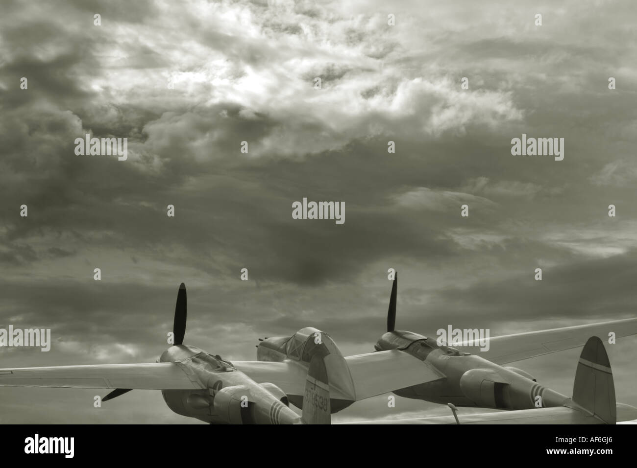 Aircraft P-38 flight thunderstorm Duotone Stock Photo