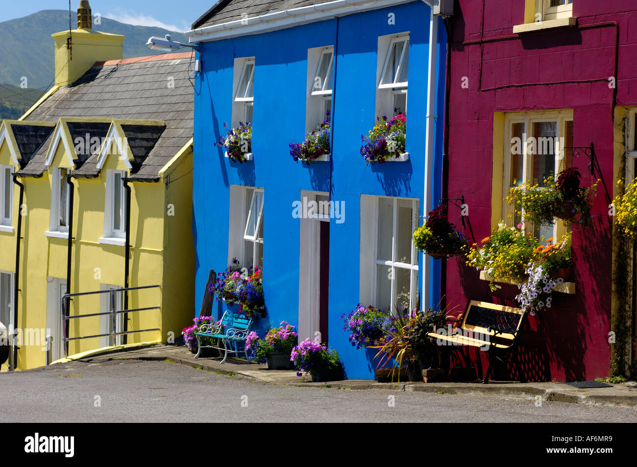 Brightly painted houses in the village of Eyeries West Cork Ireland