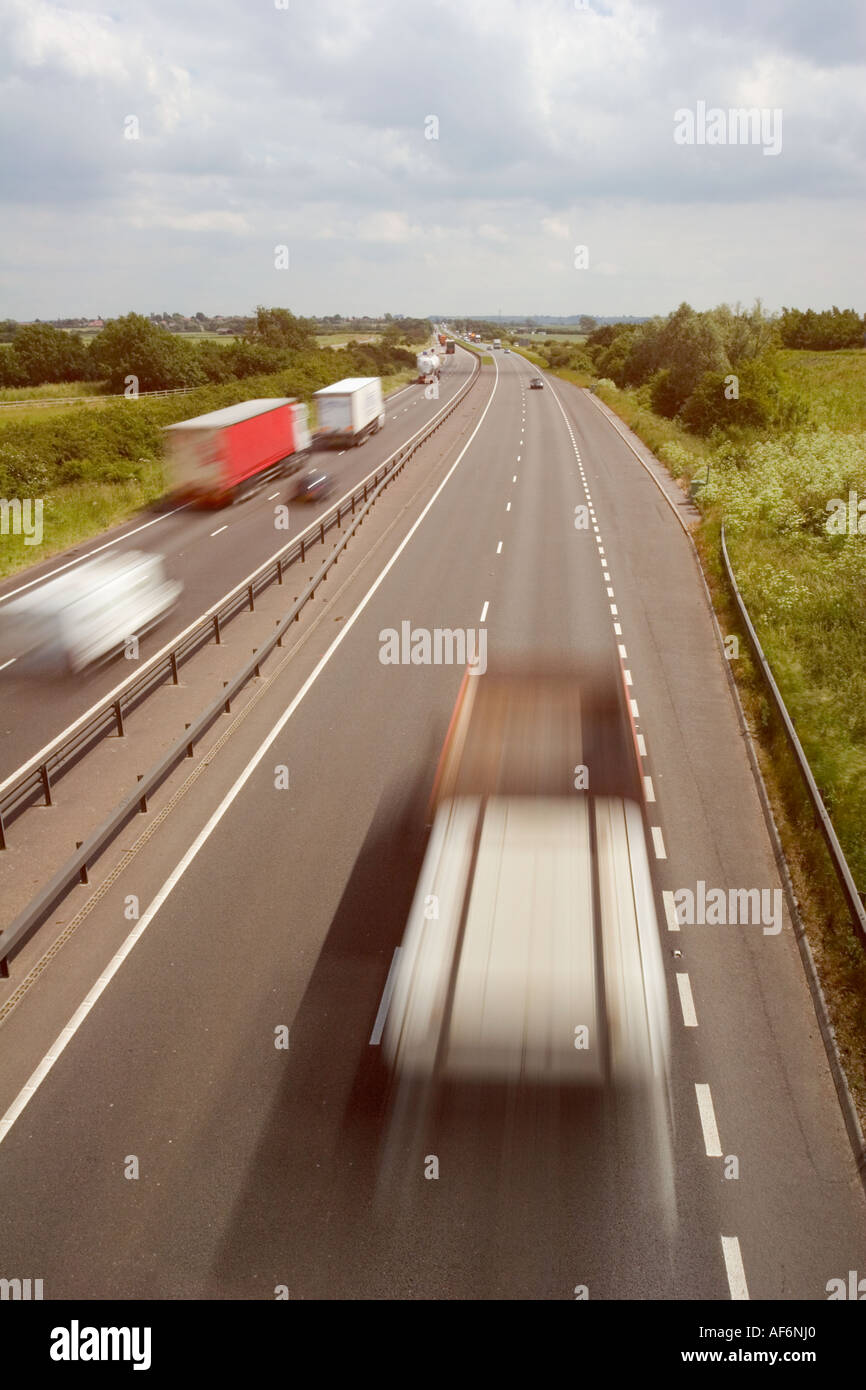 Traffic speeding along a motorway in a blur Stock Photo Alamy
