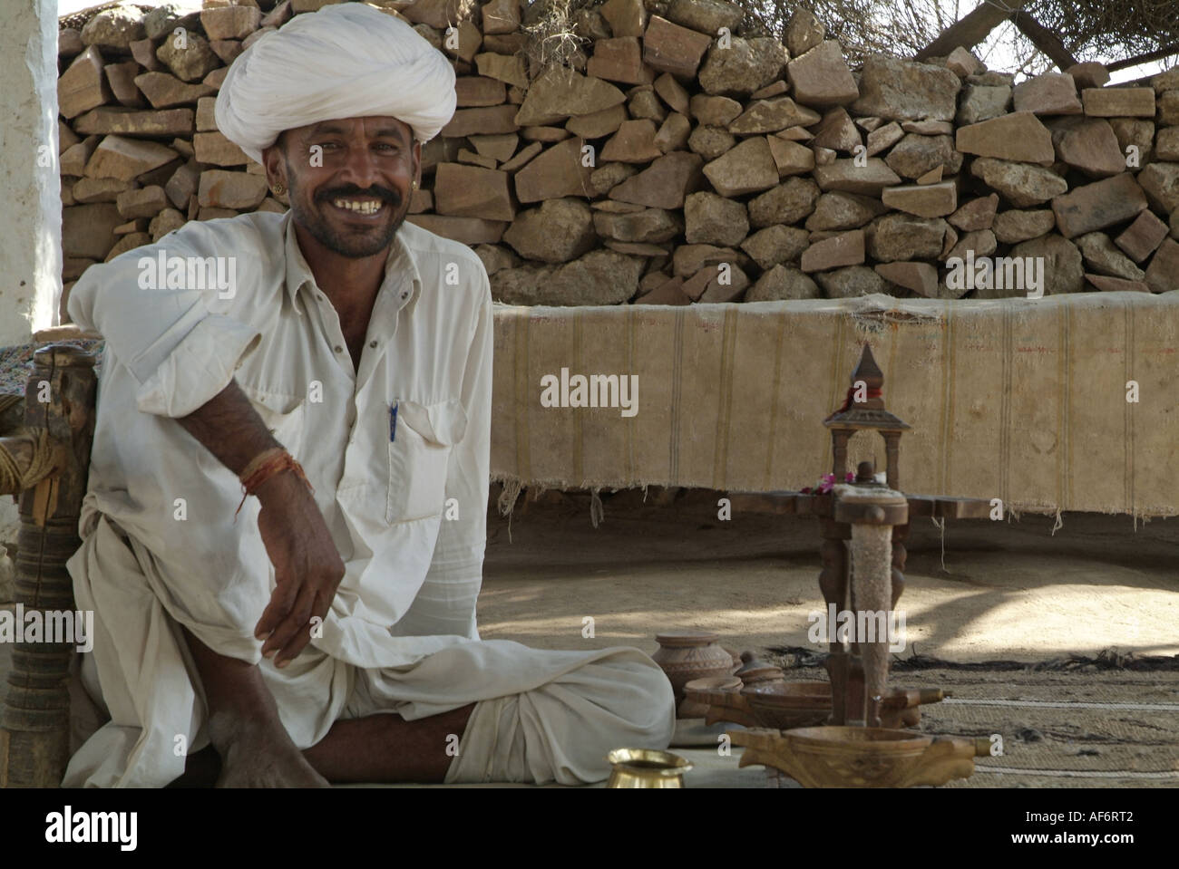 Man preparing opium in Rajasthan India Stock Photo