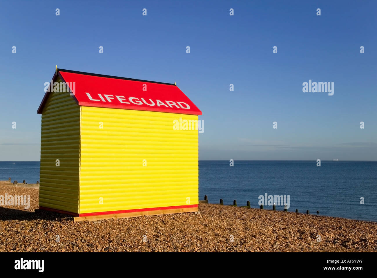Lifeguard station on a beach at sunrise Stock Photo