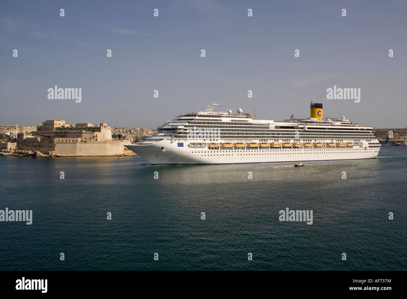 The cruise liner Costa Concordia departing from the Grand Harbour, Malta Stock Photo