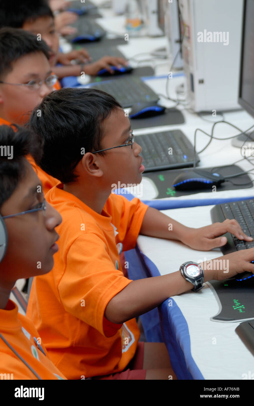Singapore schoolchildren participating in national computer competition ...