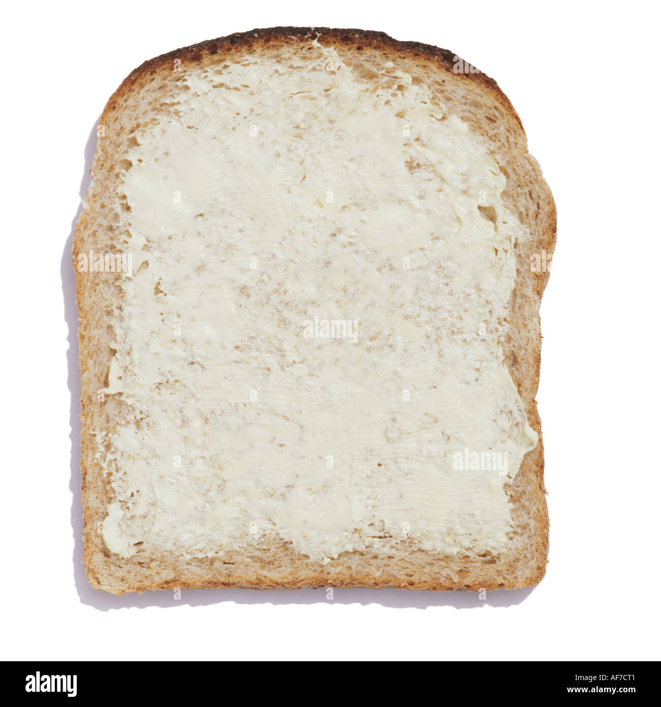 A buttered slice of wholemeal bread Stock Photo Alamy