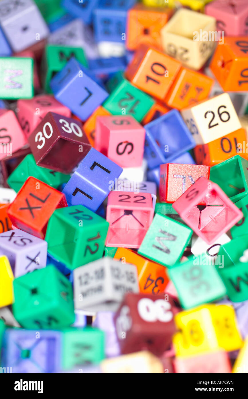 Size tags for clothing in a clothes shop Stock Photo Alamy