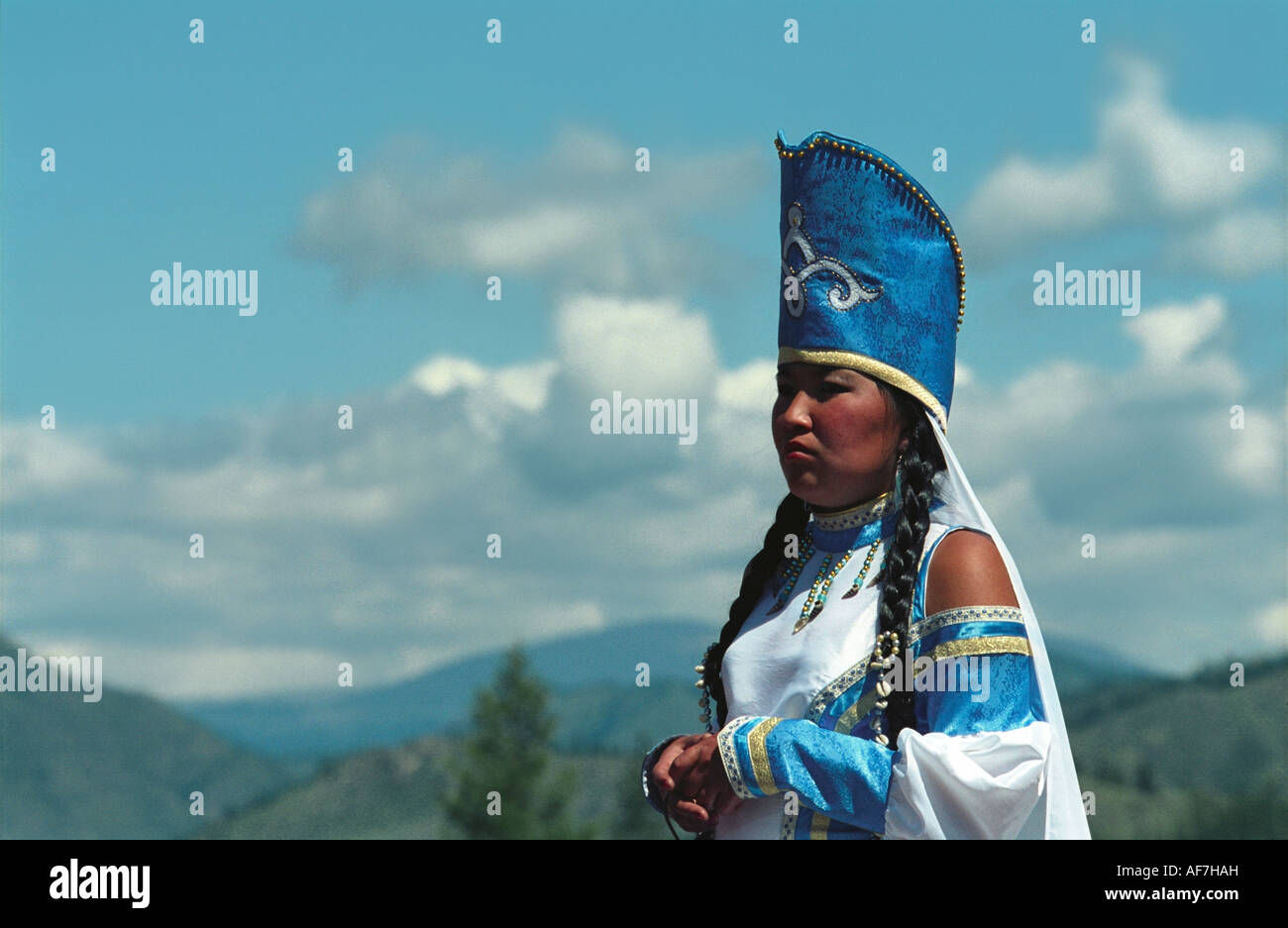 Portrait of young woman in native Altaic costume.  El-Oiyn -  national festival of Altaic people. Russia Stock Photo