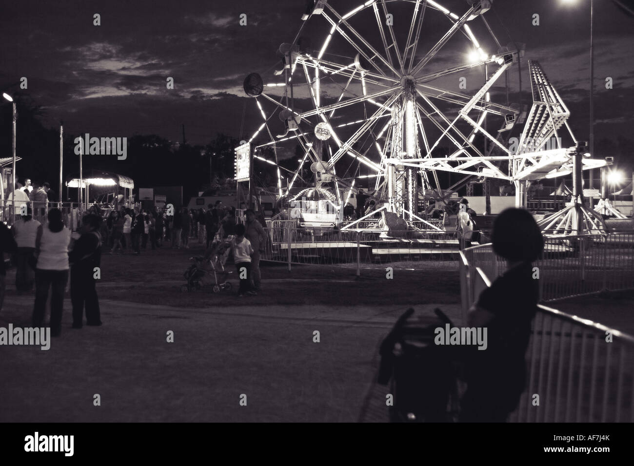 Lady by Ferris Wheel in Culver City West Los Angeles California USA Stock Photo