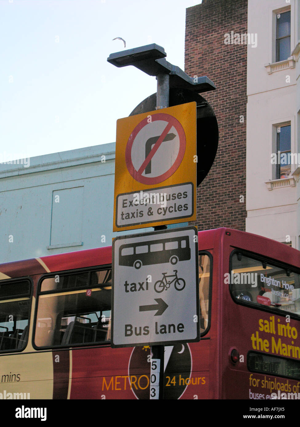 signs for bus lane and taxis only being used by other vehicles and all