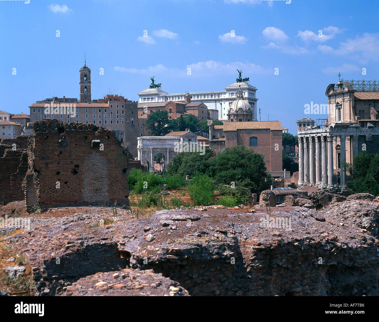 geography / travel, Italy, Rome, Forum Romanum, ruins, Regie, temple of the Iulius Caesar, Columns and the temple of Antoninus and Faustina,  Triumphal arch of the Septimius Severus ancient archaeology, columns, UNESCO, World Heritage Site, foro romano, excavations, Additional-Rights-Clearance-Info-Not-Available Stock Photo