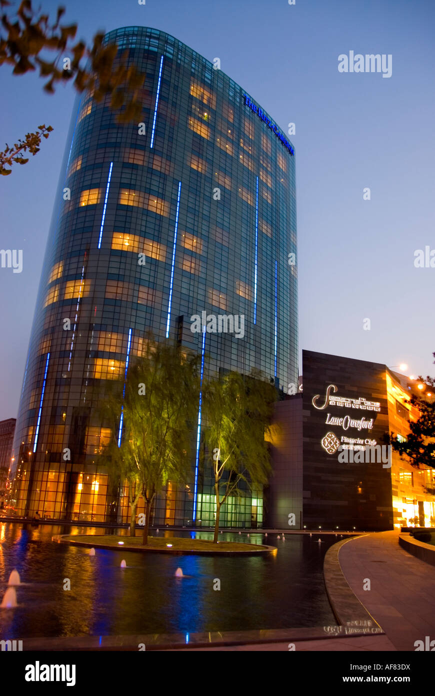 Beijing CHINA, Luxury Hotels, Exterior of the 'Ritz Carlton Hotel' in the 'Financial Street District' at Night, hotel tower, BEIJING shopping district Stock Photo
