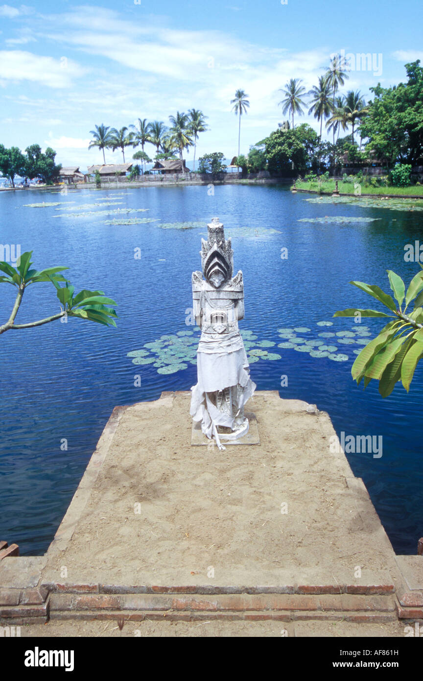 statue in front of sea, candi dasa, bali, indonesia Stock Photo
