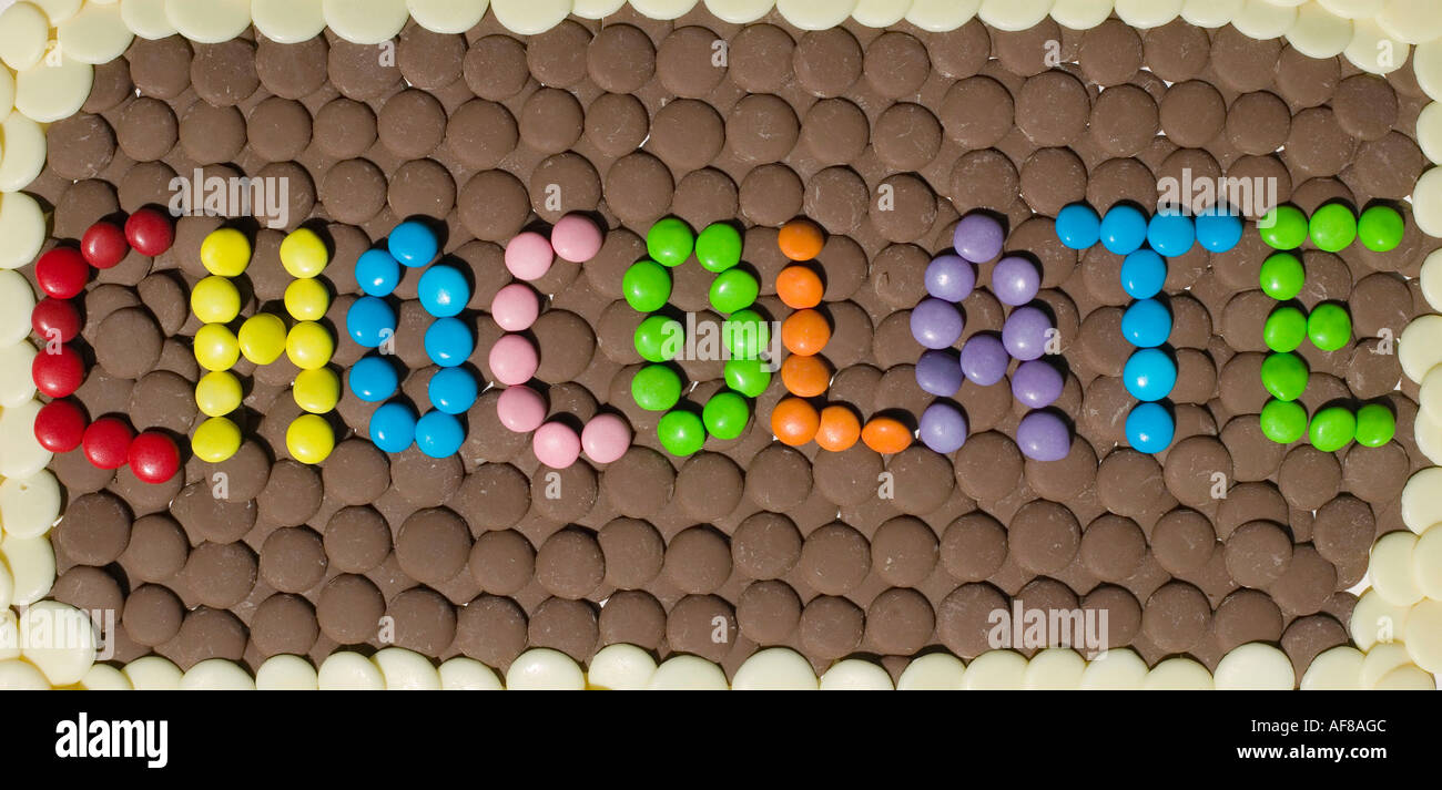 chocolates used to spell out the word chocolate Stock Photo Alamy