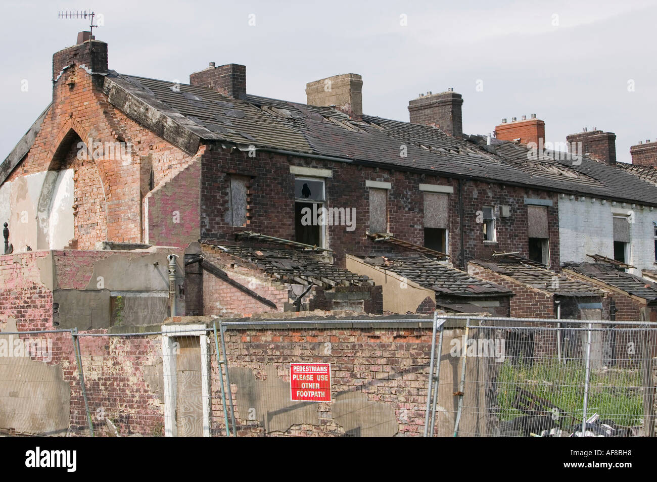 a row of old abandoned terraced houses in Blackburn, Lancashire, UK