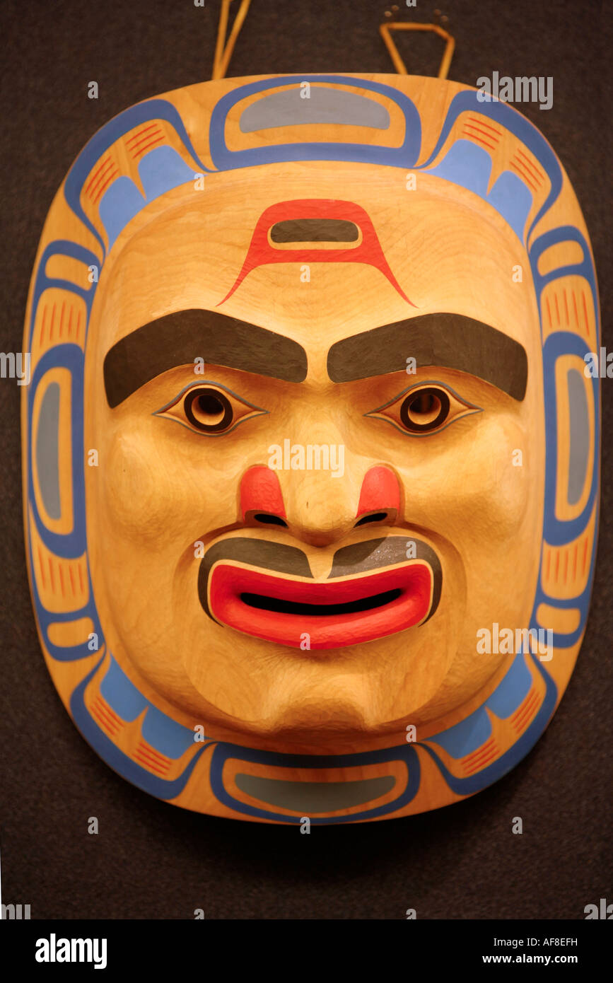 A carving of a face, mask inside the National Museum of the American Indian, Washington DC, United States USA Stock Photo