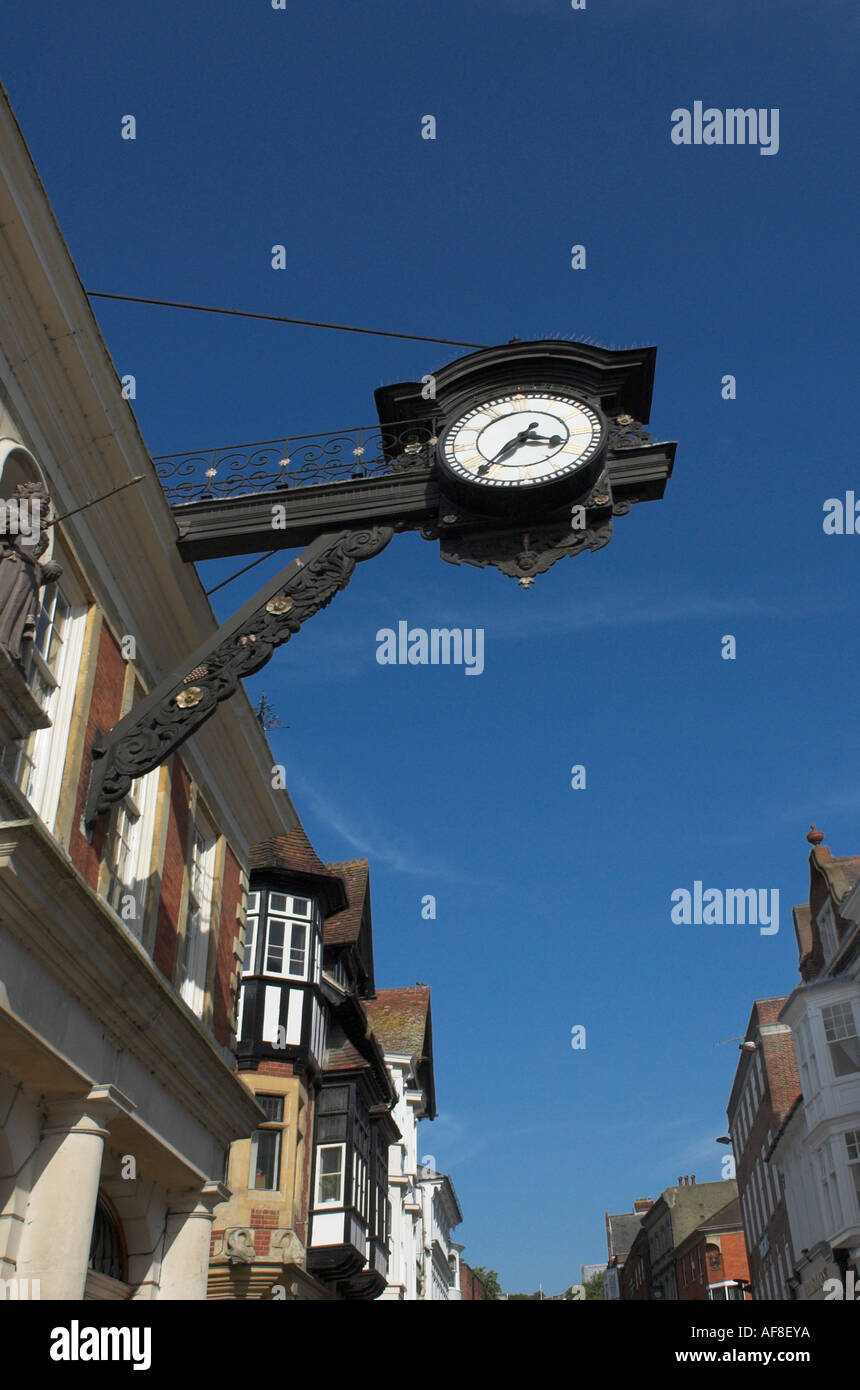 Clock above the High Street Winchester Hampshire UK Stock Photo - Alamy