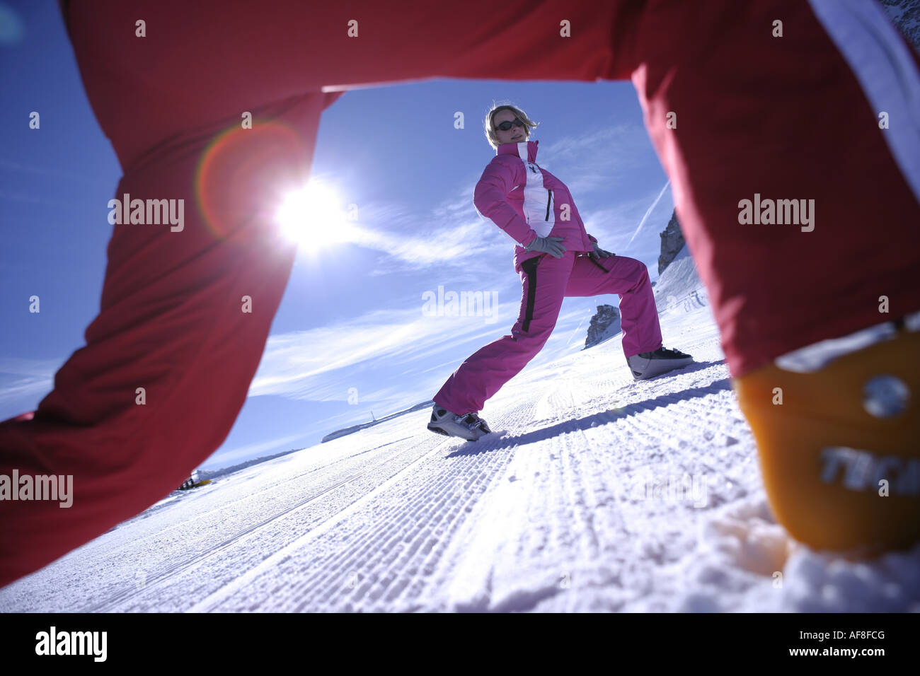 A woman having skiing lesson with a ski instructor, Hintertux Glacier, Tyrol, Austria Stock Photo